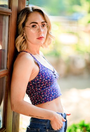 18 tear old schoolgirl Tiff Bannister takes selfies while disrobing in bedroom